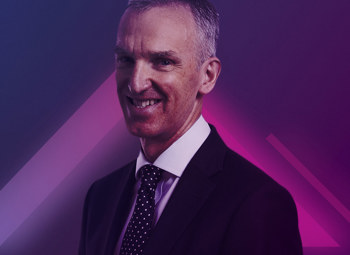Image of John Pyburn on a neon pink and purple background