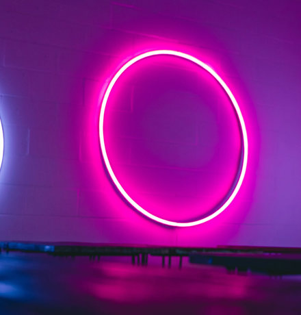 Neon circles on a wall