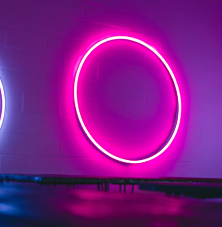 Neon circles on a wall