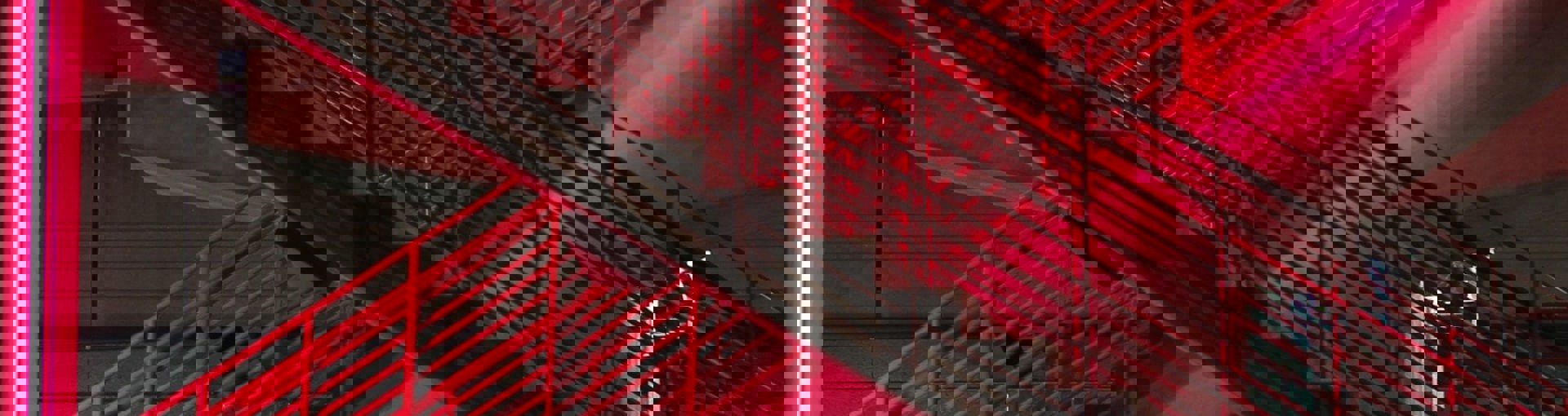 Image of red stairs in neon light
