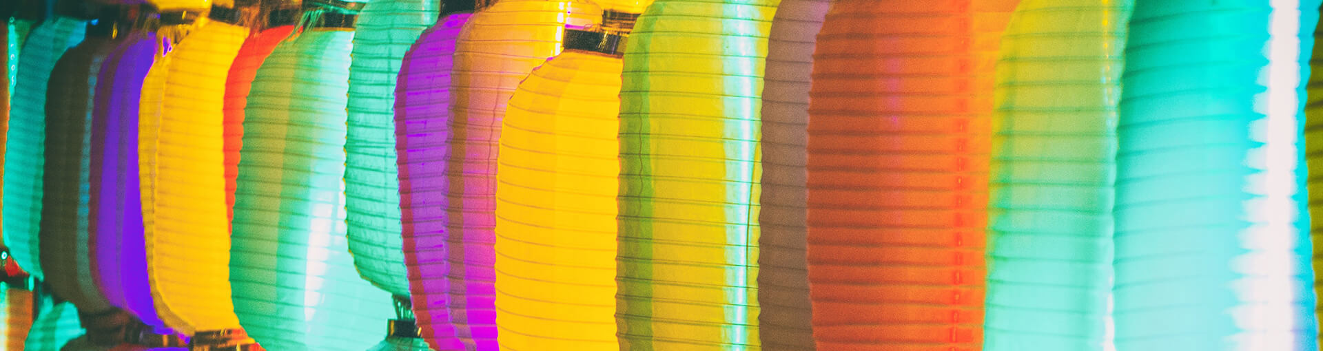 Row of brighly coloured paper lanterns