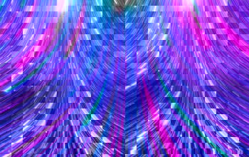 Bright neon light trails in blue pink and purple