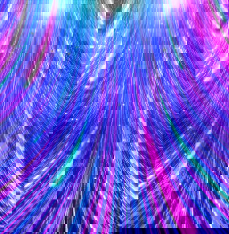 Bright neon light trails in blue pink and purple