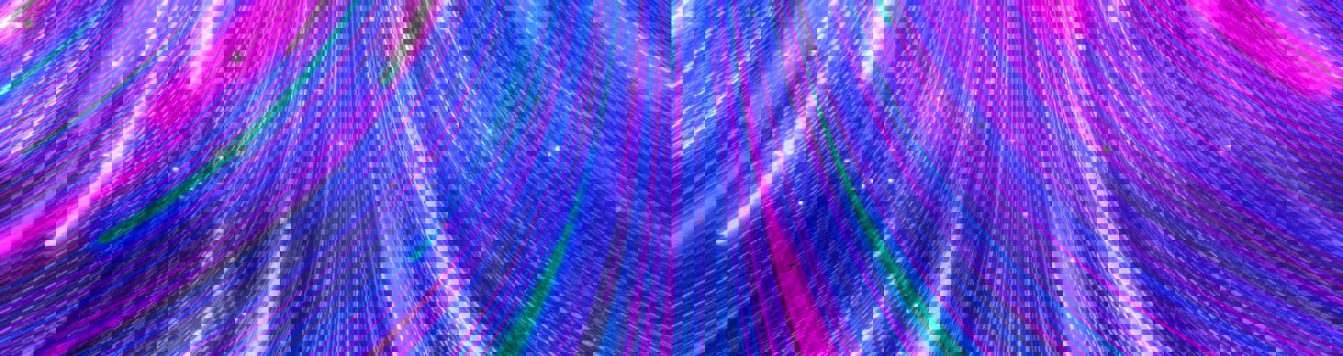 Bright neon light trails in blue pink and purple