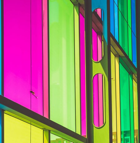 Building glass in various neon colours