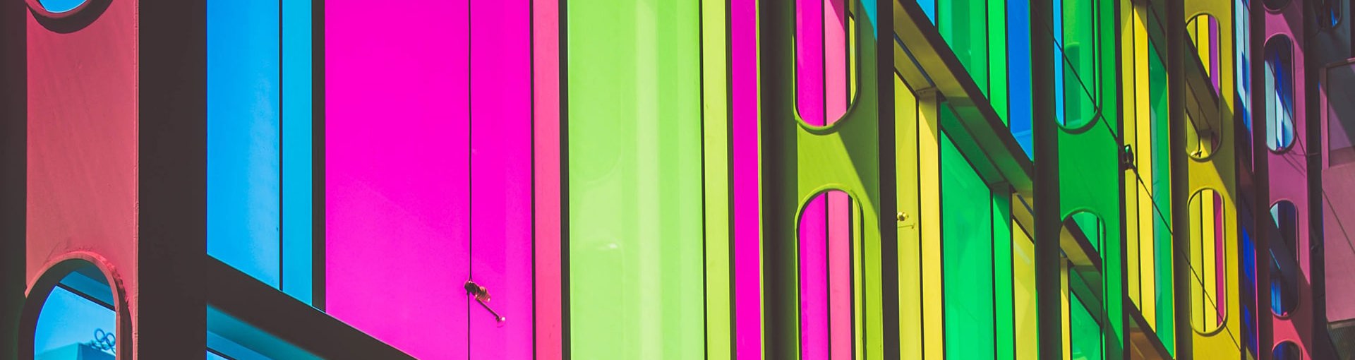 Building glass in various neon colours