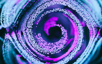 Abstract close up of a stamen with neon pollen