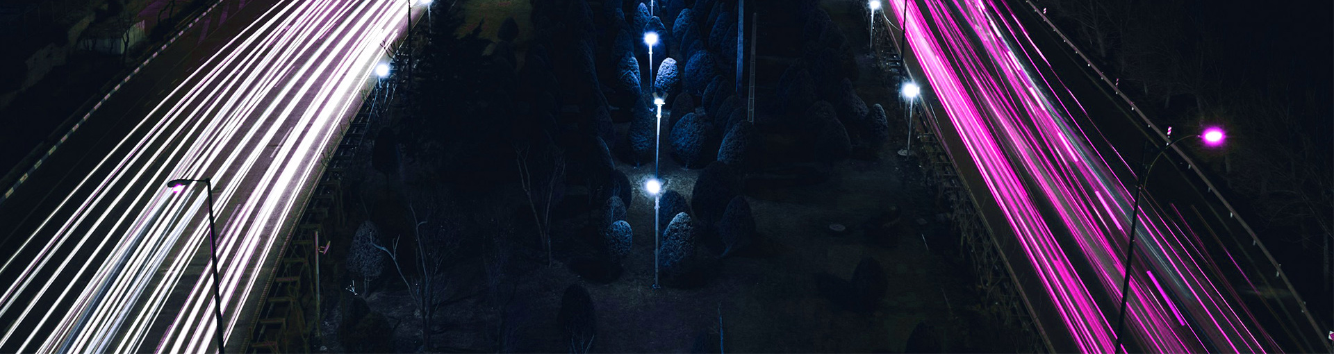 Image of highway with neon lights from car trails