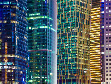 Image Of City Buildings Lit Up
