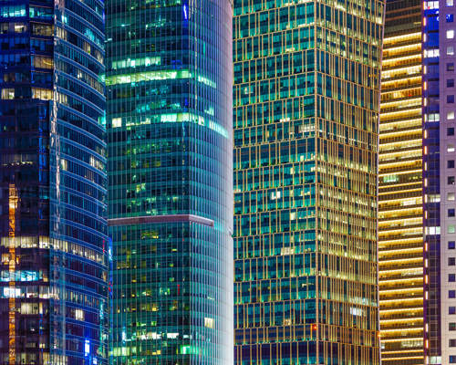 Image Of City Buildings Lit Up