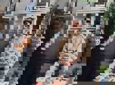 Young person in room with a counseller