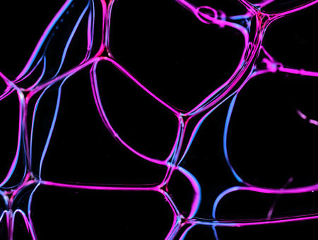 Close up of bubbles with neon highlights